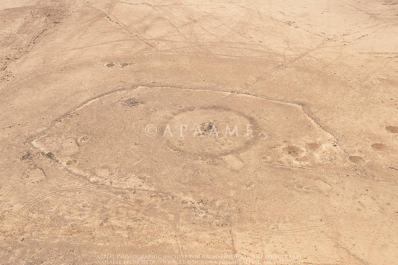Figure 1: A 2009 aerial photograph (APAAME_20091019_DLK-0214 Jimal Stone Circle 2, Jimal Kite 3) shows two of the features now built over by the camp.