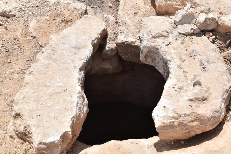  Figure 7: Cistern opening at MAD-0077 (photo P. Flohr/EAMENA). The site of MAD-0077 showed several cisterns/caves/tombs, but was largely destroyed by construction between 2006 and 2016 (see here for images). The site visit in May 2017 confirmed the site 