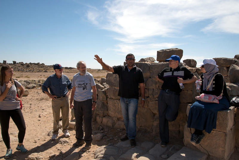  Figure 3: APAAMEG_20150927_REB-0048 – Muwaffaq Hazza speaks at the Gate of Commodus on the north west side of the town.