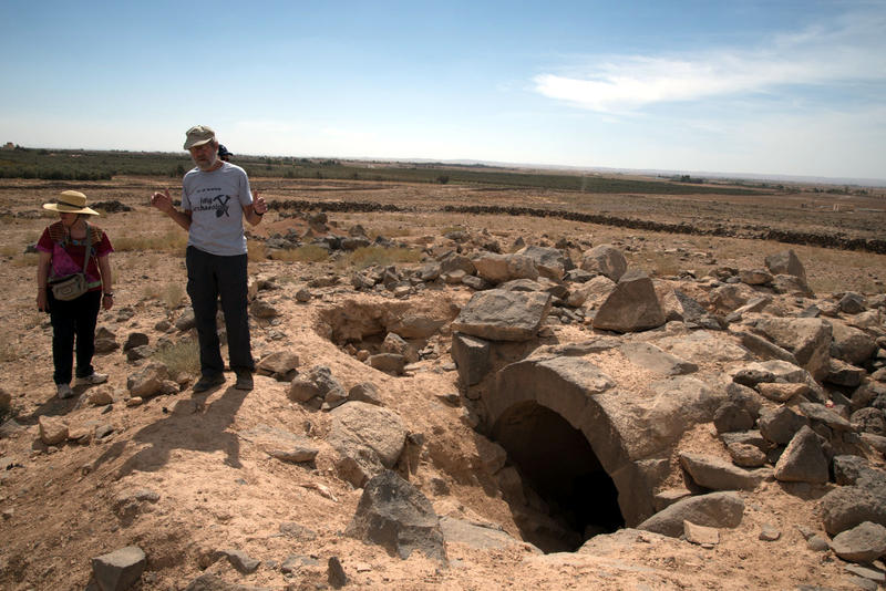 Figure 2: APAAMEG_20150927_REB-0052 – Bert De Vries stands next to one of the few remaining ancient monumental tombs