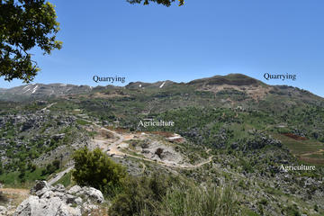 Figure 3: Photo taken from the southern slopes of Jabal Moussa, showing the impact of quarrying, a road and agriculture (facilitated through the easy access provided by the road) on the landscape surrounding the reserve.